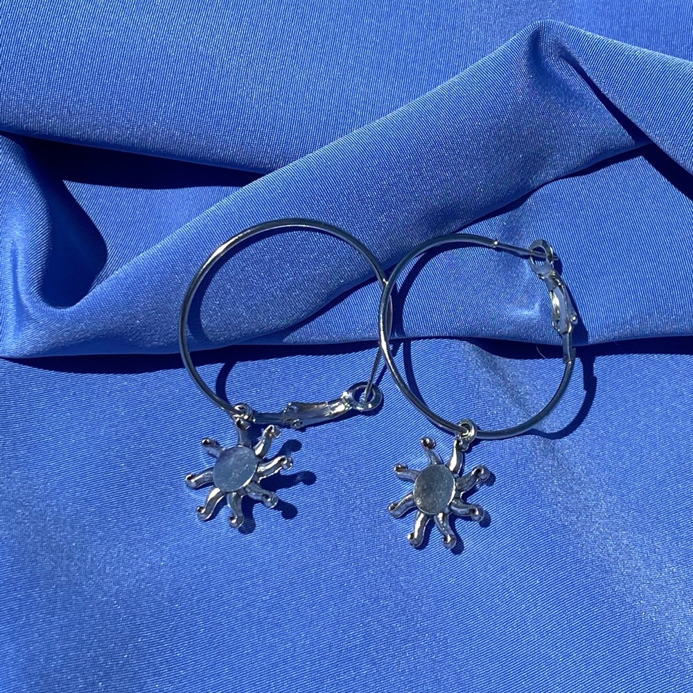 Silver sun hoops made by me!